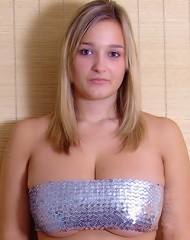 Top British big boob teen H cup holly teases in a boob tube.